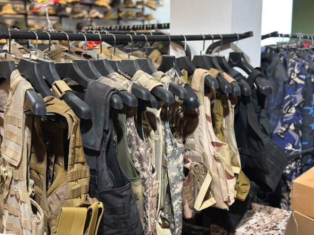 Military and security clothing displayed inside Taj Libya